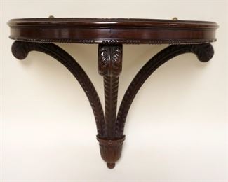 1131	CARVED WALNUT DEMILUNE WALL SHELF W/SCROLLED PLUME SUPPORTS, APPROXIMATELY 13 IN X 23 IN X 21 IN HIGH
