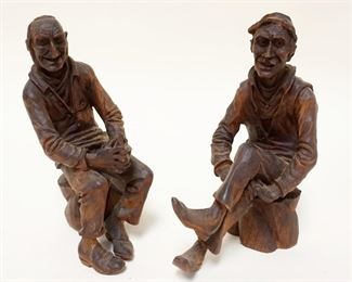 1132	CARVED WOOD FOLK ART FIGURES OF MAN SITTING ON TREE STUMPS, APPROXIMATELY 9 IN HIGH
