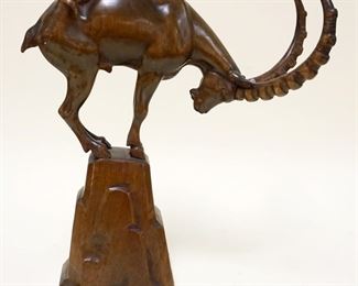 1134	WOOD CARVING OF A RAM ON ROCK LEDGE, APPROXIMATELY 13 IN HIGH
