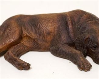 1138	ANTIQUE WOOD CARVING OF DOG W/GLASS EYES, RESTING, APPROXIMATELY 7 IN X 1 1/2 HIGH
