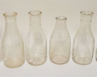 1164	LOT OF 8 ANTIQUE MILK BOTTLES INCLUDING WELSH FARMS, WILLOW BROOK, FLYING HILL FARM, ETC
