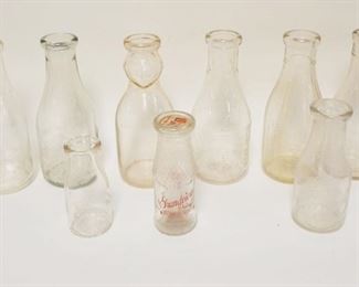 1165	LOT OF 11 ANTIQUE MILK BOTTLES INCLUDING COP TOP, GRANDVIEW, WALDRON'S, WELSH FARMS, REEVE HARDEN, ETC
