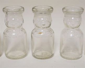 1167	ANTIQUE MILK BOTTLES 5 PINT
