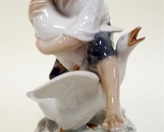 1246	ROYAL COPENHAGEN FIGURINE OF YOUNG BOY WITH GEESE, APPROXIMATELY 7 IN H
