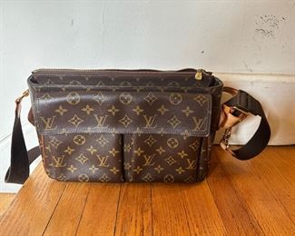 Louis Vuitton Viva Cite bag (strap for LV suitcase attached here on accident) this does come with original leather strap.