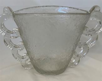 Daum Vase With Frosted Crackled Glass Style Decor. A Superb Vase in Molded-Pressed Glass. A Creation by Pierre d'Avesn for the Daum Frères factory, circa 1930’’s.  This piece is characteristic of the work of Pierre d'Avesn when he was artistic director of the Daum Frères house between 1930 and 1936.
Dimensions : 7”H x 10”W x 4 3/4”D)