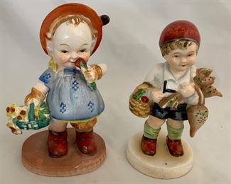 Japan Vintage (1940-50’s) Figurines:  Little Girl Smelling Flower with Flower Basket and Little Boy with Turnips and Vegetable Basket.  Each about 6” H