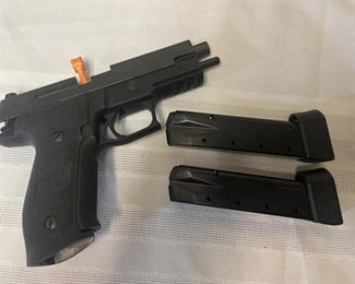 g Sauer P226 9mm handgun w/ 2 clips       