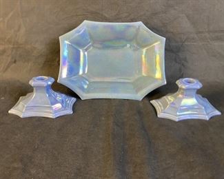 ntique 20's three piece Cowan Pottery blue lusterware mantle set. Includes footed console bowl, 11" l.,  and a pair of candleholders, 3" h.