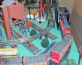 FULL TOWN WITH 3 TRAINS RUNNING THUR IT - WITH BUILDING - VEHICALS - TREES - PEOPLE - BASEBALL FIELD & PLAYERS - TRAIN STATION - TRAIN WITH FULL CARS - LOGS - ANIMALS - ETC.