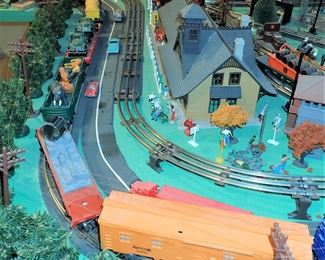 FULL TOWN WITH 3 TRAINS RUNNING THUR IT - WITH BUILDING - VEHICALS - TREES - PEOPLE - BASEBALL FIELD & PLAYERS - TRAIN STATION - TRAIN WITH FULL CARS - LOGS - ANIMALS - ETC.