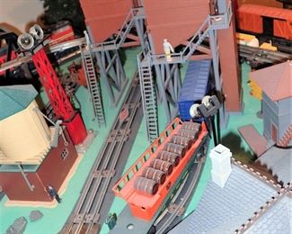 FULL TOWN WITH 3 TRAINS RUNNING THUR IT - WITH BUILDING - VEHICALS - TREES - PEOPLE - BASEBALL FIELD & PLAYERS - TRAIN STATION - TRAIN WITH FULL CARS - LOGS - ANIMALS - ETC.