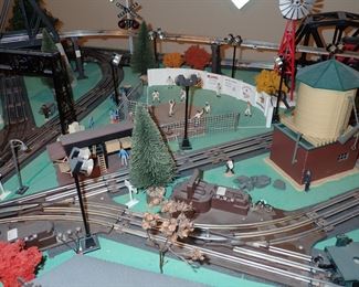 FULL TOWN WITH 3 TRAINS RUNNING THUR IT - WITH BUILDING - VEHICALS - TREES - PEOPLE - BASEBALL FIELD & PLAYERS - TRAIN STATION - TRAIN WITH FULL CARS - LOGS - ANIMALS - ETC.