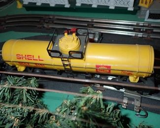 FULL TOWN WITH 3 TRAINS RUNNING THUR IT - WITH BUILDING - VEHICALS - TREES - PEOPLE - BASEBALL FIELD & PLAYERS - TRAIN STATION - TRAIN WITH FULL CARS - LOGS - ANIMALS - ETC.