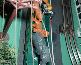 FULL TOWN WITH 3 TRAINS RUNNING THUR IT - WITH BUILDING - VEHICALS - TREES - PEOPLE - BASEBALL FIELD & PLAYERS - TRAIN STATION - TRAIN WITH FULL CARS - LOGS - ANIMALS - ETC.