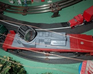 FULL TOWN WITH 3 TRAINS RUNNING THUR IT - WITH BUILDING - VEHICALS - TREES - PEOPLE - BASEBALL FIELD & PLAYERS - TRAIN STATION - TRAIN WITH FULL CARS - LOGS - ANIMALS - ETC.