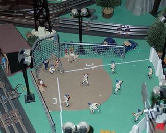 FULL TOWN WITH 3 TRAINS RUNNING THUR IT - WITH BUILDING - VEHICALS - TREES - PEOPLE - BASEBALL FIELD & PLAYERS - TRAIN STATION - TRAIN WITH FULL CARS - LOGS - ANIMALS - ETC.