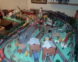 FULL TOWN WITH 3 TRAINS RUNNING THUR IT - WITH BUILDING - VEHICALS - TREES - PEOPLE - BASEBALL FIELD & PLAYERS - TRAIN STATION - TRAIN WITH FULL CARS - LOGS - ANIMALS - ETC.