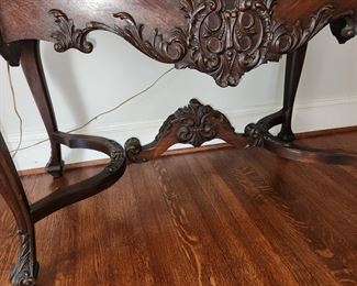 table by Johnson Handley, ornate detail