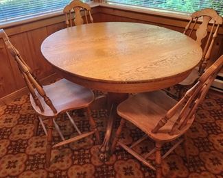Antique Claw Foot Round Table with Four Vintage Chairs