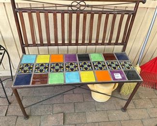 Wrought iron bench with tile top