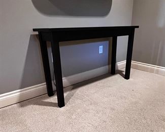 $75 USD      Black Contemporary Sleek Wood Console Table GM185-11     Description: Simple and extremely useful!  Great piece that can be used anywhere for a multitude of functions. Entry table, hall console, TV table, sofa table.....
Dimensions:  48 x 16 x 29 in
Condition: Good physical and mechanical condition. 
Location: Local pick up Vancouver WA 98661.  Shipper suggestions available upon request. Item is located on the 3rd floor of a condominium complex with very easy access to an elevator. PICK UP AFTER MAY 15th      https://goodbyhello.com/products/copy-of-tempurpedic-ergo-queen-size-adjustable-bed-frame-gm185-10?_pos=1&_sid=b107abd28&_ss=r