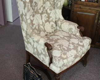 One of a pair of wing chairs