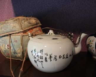Vintage Chinese porcelain teapot with silk cover