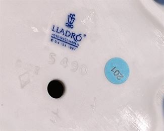 Lladro 5490 Flor Maria Flamenco Figurine Girl Holding Basket of Flowers Porcelain Figurine 9.5 inches high.