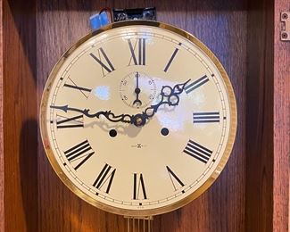 As-IS Howard Miller Wall Clock 50 x 18.5 by 8.75in HxWxD