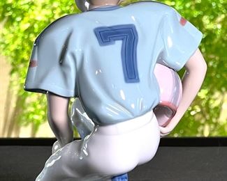 Lladro 6107 Football Player Porcelain Figurine 7.5 inches high.