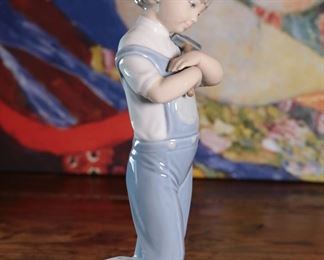 Lladro 4897 Mechanic Boy with Hammer & Toy Truck Porcelain Figurine 8.25 inches high.