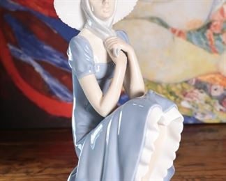 NAO By Lladro 0229 Girl with Straw Hat Porcelain Figurine 11.25 inches high.