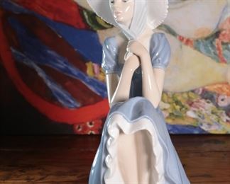 NAO By Lladro 0229 Girl with Straw Hat Porcelain Figurine 11.25 inches high.