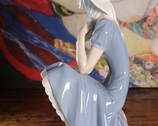NAO By Lladro 0229 Girl with Straw Hat Porcelain Figurine 11.25 inches high.