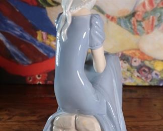 NAO By Lladro 0229 Girl with Straw Hat Porcelain Figurine 11.25 inches high.