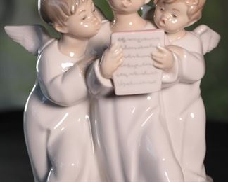 Lladro 4542 Group 3 Choir Angel Children Singing Porcelain Figurine 7.25 inches high.