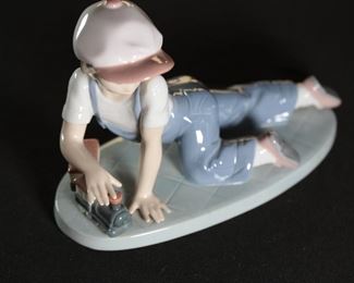 Lladro 7619 All Aboard Boy With Train Porcelain Figurine 5 inches high