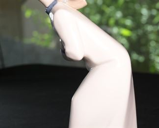 REX Spain Porcelain Figurine Girl Leaning 8.75 inches high.