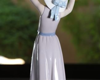 Lladro 5011 Coy Girl Holding Hat Porcelain Figurine #2 10.25 inches high.