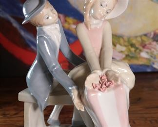 D'Art SA Boy and Girl on Bench Porcelain Figurine 7.75 inches high.