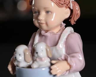 Nadal Girl with Puppies Porcelain Figurine