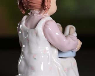 Nadal Girl with Puppies Porcelain Figurine