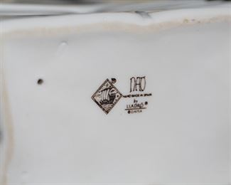 NAO by Lladro Newspaper Boy Porcelain Figurine 9.5 inches high.