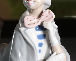 Casades Porcelain Clown Lying Down Porcelain Figurine 7.25 inches high.
