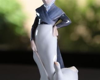 Royal Copenhagen 528 lady with Goose Porcelain Figurine 7.25 inches high.