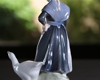 Royal Copenhagen 528 lady with Goose Porcelain Figurine 7.25 inches high.
