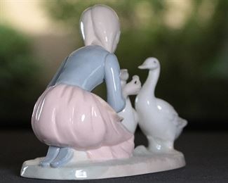 Duncan Royale Girl Feeding Ducks Porcelain Figurine 5.25 inches high.