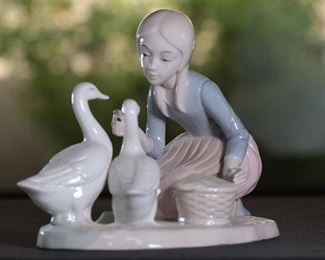 Duncan Royale Girl Feeding Ducks Porcelain Figurine 5.25 inches high.