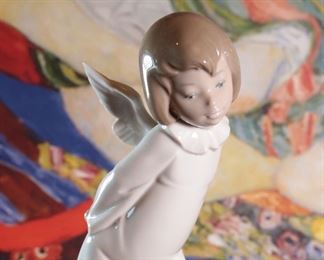 Lladro 4960 Curious Angel Porcelain Figurine 	9.5 inches high.	